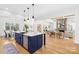 Bright, open living space featuring a large kitchen island with barstool seating at 2010 Bessbrook Rd, Fort Mill, SC 29708