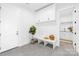 Bright mud room with white cabinets, bench seating, and tiled floor at 2010 Bessbrook Rd, Fort Mill, SC 29708