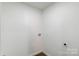 Laundry room is all white at 209 Palmer St, Shelby, NC 28150