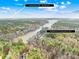 Aerial view of the property showing lake access and proximity to Downtown Mooresville at 228 Wildwood Cove Dr, Mooresville, NC 28117