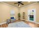 Bedroom featuring hardwood floors, a bench, and an outdoor access door at 228 Wildwood Cove Dr, Mooresville, NC 28117