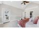 Relaxing bedroom with light and neutral tones and a private entry to the outside at 228 Wildwood Cove Dr, Mooresville, NC 28117
