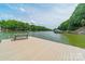 Picturesque lakefront dock with ample space for lounging and enjoying waterfront activities at 228 Wildwood Cove Dr, Mooresville, NC 28117