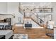 Expansive living room showcasing a grand staircase, and hardwood floors at 228 Wildwood Cove Dr, Mooresville, NC 28117