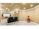 Home theater room with projector screen, theatre seating and popcorn machine at 228 Wildwood Cove Dr, Mooresville, NC 28117