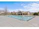 Large community pool with surrounding concrete and lounge area offers residents a great space to relax at 2464 Chatham Dr, Indian Land, SC 29707