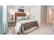Comfortable bedroom with a decorative headboard, side tables and lamps, and plush bedding at 296 Laura Elizabeth Ln, Clover, SC 29710