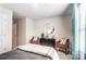 Well-decorated bedroom featuring a large bed, a black dresser, and inviting armchairs at 296 Laura Elizabeth Ln, Clover, SC 29710