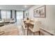 Dining room featuring neutral color palette, dark wood table, light chairs, hardwood floors, and an open floorplan at 296 Laura Elizabeth Ln, Clover, SC 29710