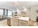 Kitchen island with barstool seating, sleek cabinetry, and contemporary pendant lighting at 296 Laura Elizabeth Ln, Clover, SC 29710