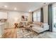 Bright living room features contemporary decor, stylish furniture, and sliding glass doors to the outdoor space at 296 Laura Elizabeth Ln, Clover, SC 29710