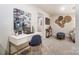 Bright home office area features a modern desk, decor, stylish chair, and comfortable seating at 296 Laura Elizabeth Ln, Clover, SC 29710