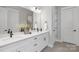 Modern bathroom featuring double vanity, white countertop, and stylish fixtures at 3924 13Th Ne St, Hickory, NC 28601