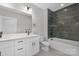 Contemporary bathroom with double vanity, tub, and tiled shower at 3924 13Th Ne St, Hickory, NC 28601