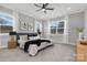 Bright Primary bedroom with neutral walls, carpet, large windows, and stylish furniture at 3924 13Th Ne St, Hickory, NC 28601