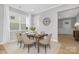 Cozy dining area with natural light, modern table setting, and neutral decor at 3924 13Th Ne St, Hickory, NC 28601