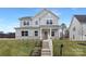 Beautiful two-story home with inviting porch, detailed trim, and manicured lawn at 3924 13Th Ne St, Hickory, NC 28601