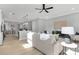 Open-concept living room with view to kitchen, modern decor, and hardwood floors at 3924 13Th Ne St, Hickory, NC 28601