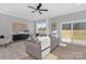 Bright living room featuring stylish furniture, large windows, and hardwood floors at 3924 13Th Ne St, Hickory, NC 28601