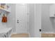 Clean mud room area with built-in bench, storage, and access to the rest of the home at 3924 13Th Ne St, Hickory, NC 28601