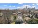 This aerial shows a lovely home with an up-close view of the Charlotte skyline in the background at 416 E 18Th St, Charlotte, NC 28206
