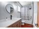 Modern bathroom with a stylish vanity, updated fixtures, and a shower-tub combination at 416 E 18Th St, Charlotte, NC 28206