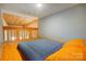 Cozy loft bedroom with a sloped ceiling, wood accents, and comfortable bedding in natural light at 416 E 18Th St, Charlotte, NC 28206