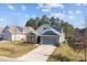 Aerial view of a home, showcasing its well-maintained lawn and neighborhood at 4288 Legacy Dr, Denver, NC 28037