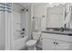 Bathroom featuring tub/shower combination, vanity with granite countertop and modern fixtures at 4288 Legacy Dr, Denver, NC 28037