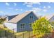 A lovely view of the side exterior of the home featuring the home's architectural roof and fenced yard at 4288 Legacy Dr, Denver, NC 28037