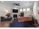 Comfortable living room featuring a fireplace and multiple windows creating an inviting space at 4288 Legacy Dr, Denver, NC 28037