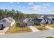 Aerial view of a suburban neighborhood with well-maintained lawns and mature trees at 4288 Legacy Dr, Denver, NC 28037