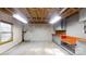 Unfinished basement featuring exposed ceiling beams, concrete floor, and unfinished storage at 4774 E Nc 150 Hwy, Lincolnton, NC 28092