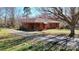 Charming one-story brick home with a well-maintained lawn and long driveway at 4774 E Nc 150 Hwy, Lincolnton, NC 28092