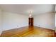 Spacious living room with hardwood floors and traditional-style lighting fixture at 4774 E Nc 150 Hwy, Lincolnton, NC 28092