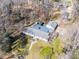 Aerial view of home with a large lot surrounded by mature trees and landscaping at 549 Briarwood Ln, Lancaster, SC 29720