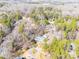 Sprawling estate nestled in a lush, wooded landscape offers privacy and tranquility at 549 Briarwood Ln, Lancaster, SC 29720