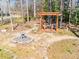 Backyard wooden pergola feature with mature landscaping in wooded area at 549 Briarwood Ln, Lancaster, SC 29720