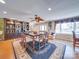 Spacious dining room featuring a large table, elegant décor, and natural light at 549 Briarwood Ln, Lancaster, SC 29720
