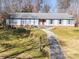 Beautiful single story home with a brick facade and a well-manicured front lawn at 549 Briarwood Ln, Lancaster, SC 29720