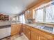 Charming kitchen featuring granite countertops and modern appliances with backyard view at 549 Briarwood Ln, Lancaster, SC 29720