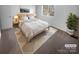 Serene bedroom showcasing a plush bed, soft lighting, and a peaceful ambiance at 6108 Heath Ridge Ct, Charlotte, NC 28210