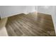 Bright living room with neutral walls and new flooring at 6108 Heath Ridge Ct, Charlotte, NC 28210