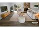 Bright living room with large windows, neutral decor, and stylish furniture arrangement at 6108 Heath Ridge Ct, Charlotte, NC 28210