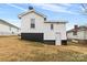 View of the backyard of a single-Gathering home with a walkout basement entrance at 612 Miller St, Kannapolis, NC 28081