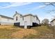 View of the backyard of a single-Gathering home with a walkout basement entrance at 612 Miller St, Kannapolis, NC 28081