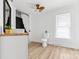 Bright and airy bathroom featuring a modern sink, toilet, and a window at 612 Miller St, Kannapolis, NC 28081