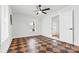 Inviting space features checkered floors, ample natural light, and fresh paint at 612 Miller St, Kannapolis, NC 28081