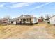 Quaint two-story home with a welcoming front porch and a simple, uncluttered landscape at 612 Miller St, Kannapolis, NC 28081