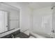 Bathroom with a granite countertop, a shower-tub, and wood-look floors at 613 N Pink St, Cherryville, NC 28021